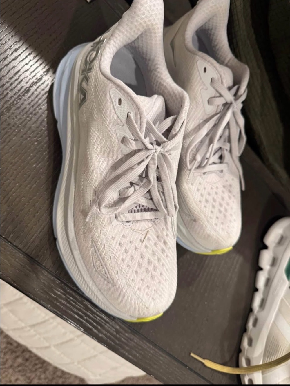 Hoka Women's Light Gray Running Shoes with Subtle Yellow Accents